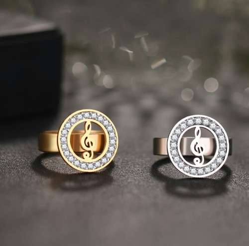 RETAIL PRICE: R 1 999 Titanium Music Note Ring With Simulated Diamond Size 9 US (GOLD)
