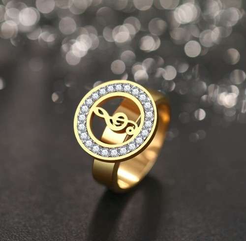 RETAIL PRICE: R 1 999 Titanium Music Note Ring With Simulated Diamond Size 9 US (GOLD)