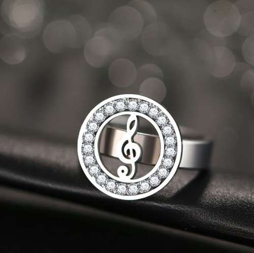 RETAIL PRICE: R 1 999 Titanium Music Note Ring With Simulated Diamond Size 9 US (GOLD)