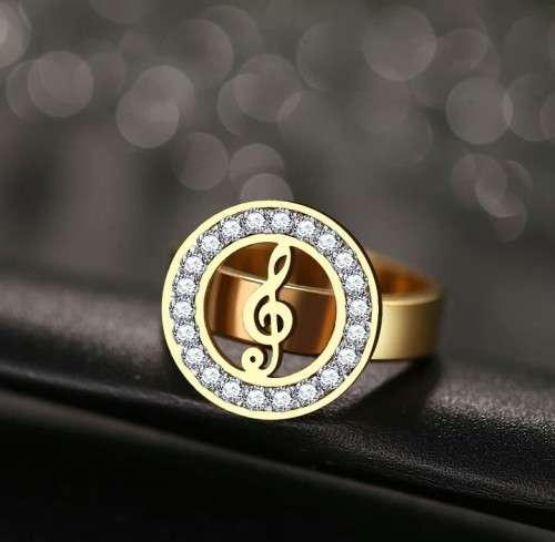 RETAIL PRICE: R 1 999 Titanium Music Note Ring With Simulated Diamond Size 9 US (GOLD)