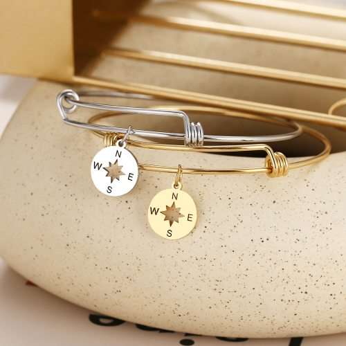 RETAIL PRICE: R 999 Adjustable Titanium "Nautical" Charm Bangle (SILVER )