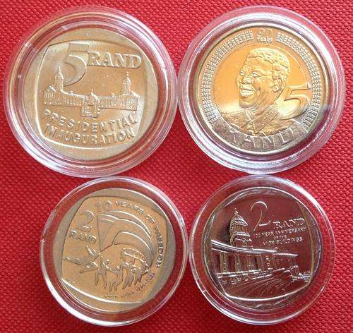 FOUR FABULOUS COMMEMORATIVE COINS IN CAPSULES (Mandela, Inauguration, Freedom, Union Buildings)