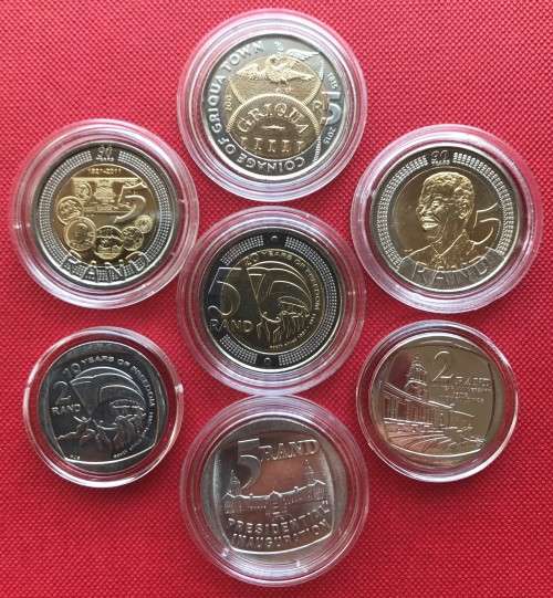 SUPER SEVEN UNC COMMEMORATIVE COINS IN CAPSULES (Griqua, Democracy, Mandela, SARB etc.)