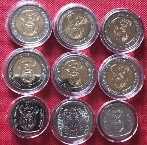 SUPERSET OF NINE COMMEMORATIVE COINS IN CAPSULES (ORT, Griqua, Democracy, Mandela, SARB etc.)