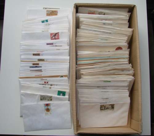 BOX OF SOUTH AFRICAN STAMPS OFF PAPER SORTED INTO 200+ ENVELOPES