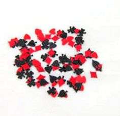 Cards, hearts, spade, diamonds , table confetti, casino theme