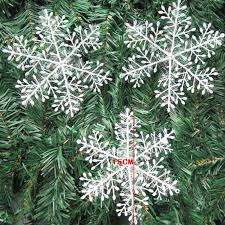 Plastic snowflakes for decor - frozen or winter party - 14cm wide - 3 per pack