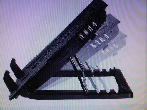 ERGOSTAND~Adjustable laptop stand with cooling fan.