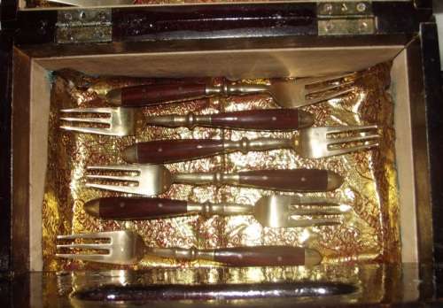60 piece brass and wood cutlery set