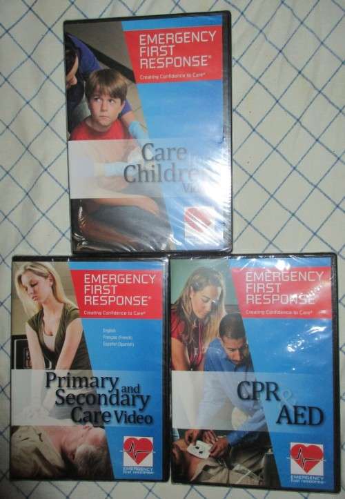 Set of Emergency  first aid books and DVD`s