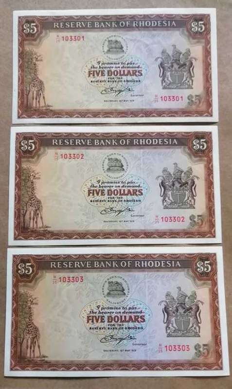 Rhodesian 5 Dollar notes in sequence (3)