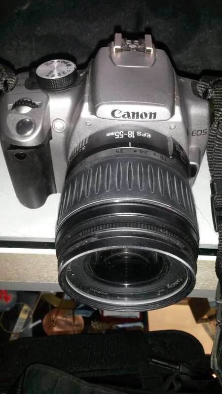 Canon EOS with extra lens and many many extras