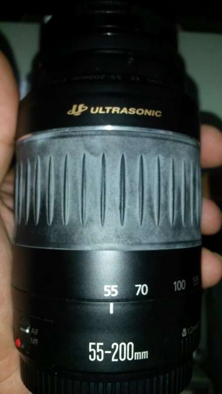 Canon EOS with extra lens and many many extras