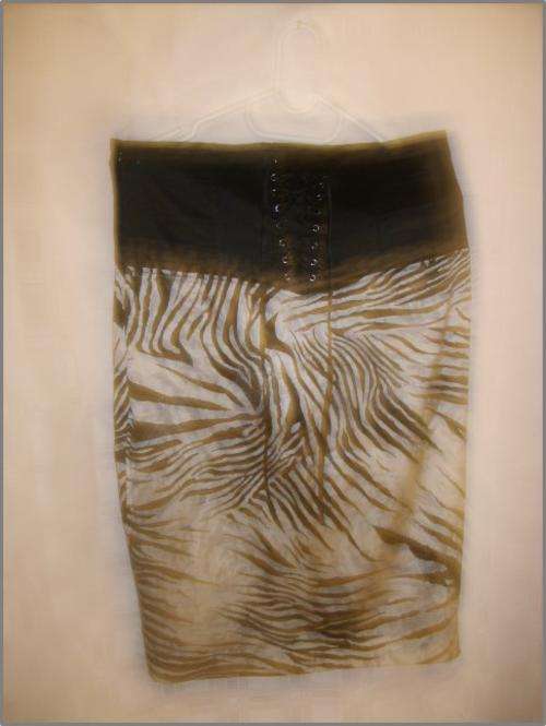 Funky skirt with leopard motive and string ties at the back Large
