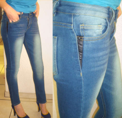 Skinny jean blue with faded detail. Size 28