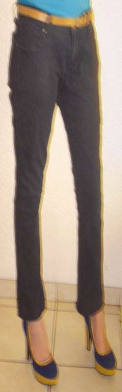 Bootleg black jean with brown belt. Size 34