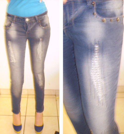 Destroyed blue jean with stitch detail. Size 32