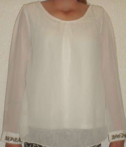 OFF WHITE SEE-THROUGH TOP. SIZE LARGE