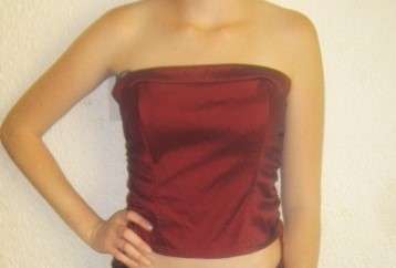 EVENING STRAPLESS TOP. WINE RED SIZE 16. AS NEW