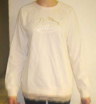 PUMA SWEATER. SIZE 12. AS NEW - LITTLE BIT SHOP SOILED; WILL WAS OUT