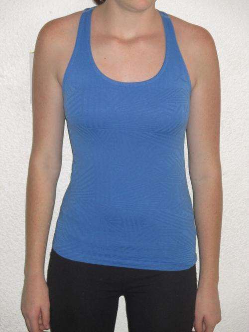 BLUE T BACK SPORTS VEST. WITH BUILD IN BRA.GOOD QUALITY. SIZE M. AS NEW
