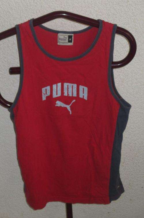 RED VEST T. PUMA. SIZE MEDIUM. CONDITION VERY GOOD