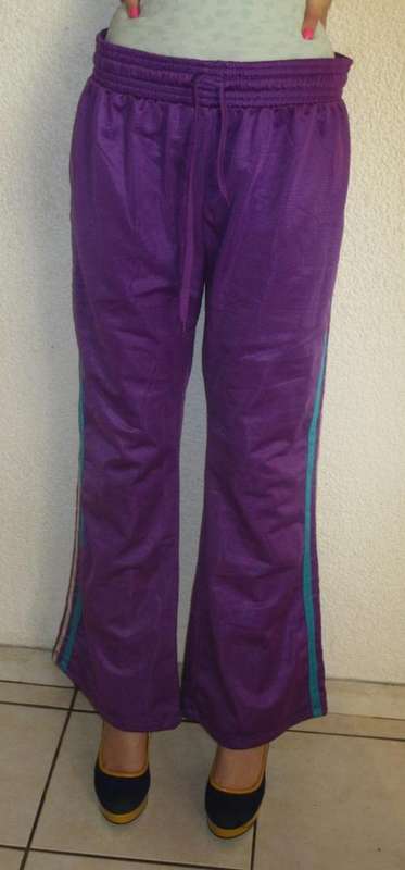 PURPLE TRACK PANTS. SIZE XLARGE. CONDITION VERY GOOD