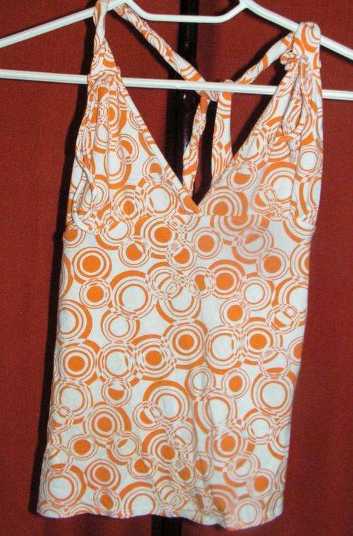STRAPPY ORANGE & WHITE TOP. PANTO. SIZE LARGE. CONDITION: AS NEW