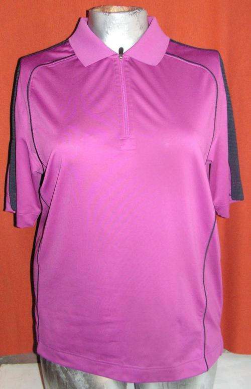 SPORTS TSHIRT. BUTTER & BUCK. SIZE LARGE. CONDITION: AS NEW