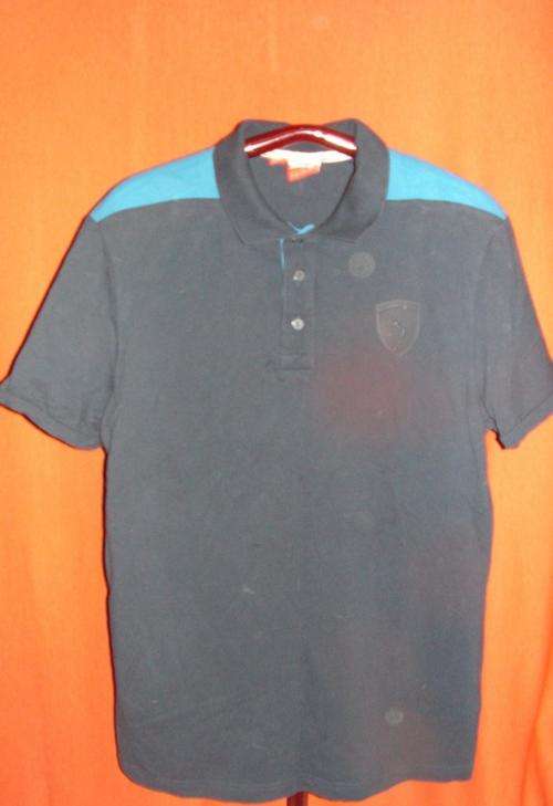 BLUE GOLFOER. FERRARI. SIZE EXTRA LARGE.. CONDITION: AS NEW