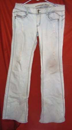 SISSY BOY DESTROYED JEANS. SIZE 14. FASIONABLY WORN.