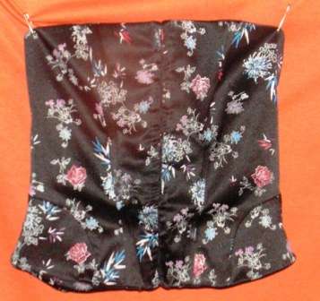 STRAPLESS FORMAL CORSETTE TOP. SIZE MEDIUM. CONDITION: AS NEW
