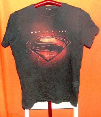 MAN OF STEEL SHIRT. SIZE SMALL. CONDITION: VERY GOOD