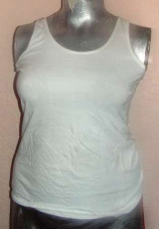 WHITE VEST T. KELSO. SIZE 16. CONDITION: VERY GOOD