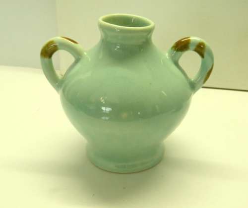 Lucia Ware candle holders and Toby