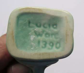 Lucia Ware candle holders and Toby