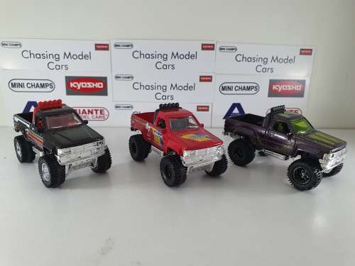 3 x Hotwheels Toyota Hilux pickups