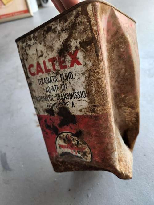 Caltex tin...damaged