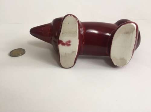 LOT 32: VINTAGE LUCIA SAUSAGE DOG VASE