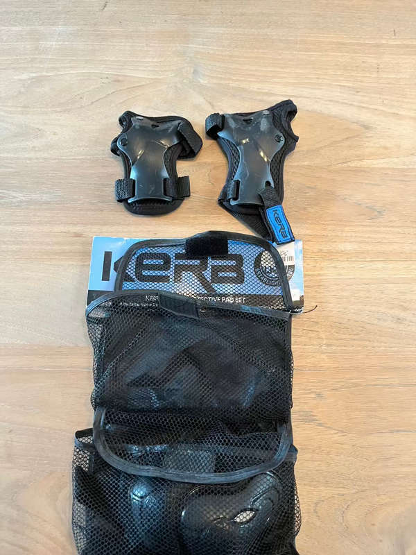 J Board plus protective gear (knees, elbows, etc.)