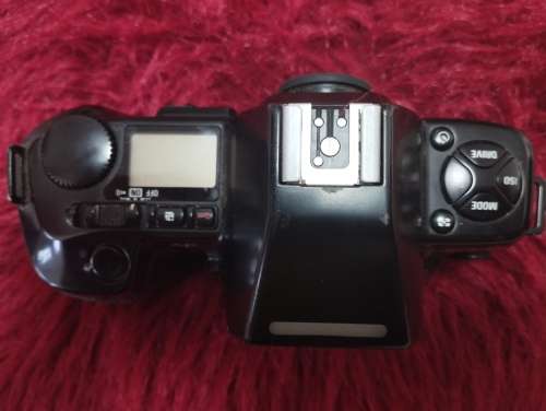 Nikon D300s plus Nikon 28-80mm lens, and various other camera equipment and gadgets as a free extra.