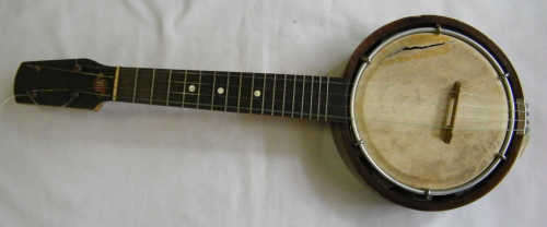Vintage RELIANCE banjo/ukulele in case - some damage - as per photo