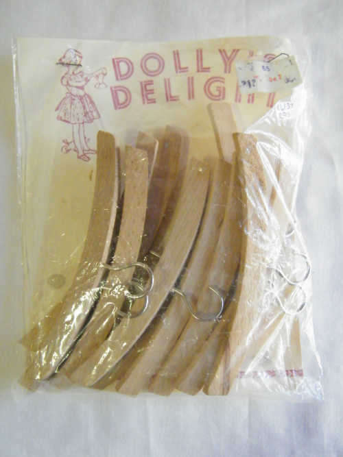 Lot of 13 Dolly's Delight Doll hangers - as per photo