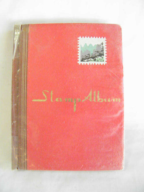 Stamp Album with some stamps - as per photo