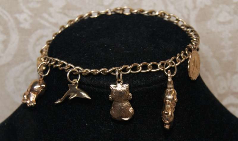 9ct Gold Charm Bracelet with 9 Gold Charms (12.2g) @ CRAZY LOW R1 START