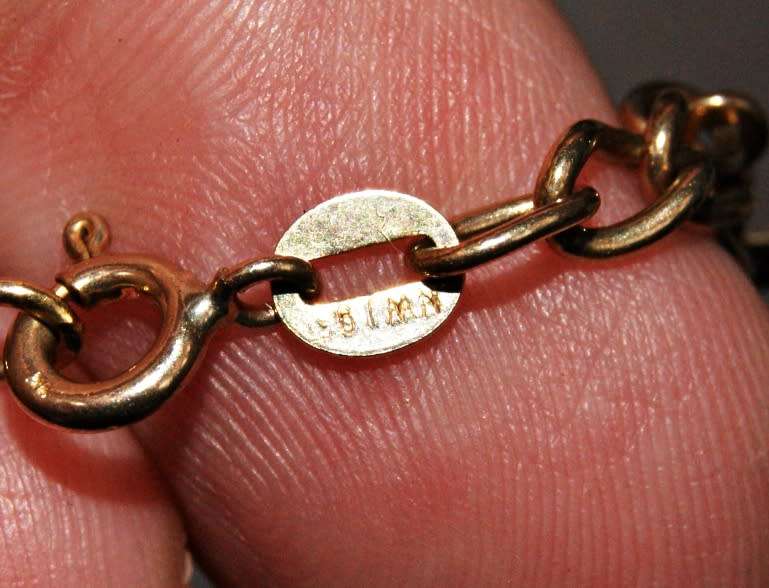 9ct Gold Charm Bracelet with 9 Gold Charms (12.2g) @ CRAZY LOW R1 START