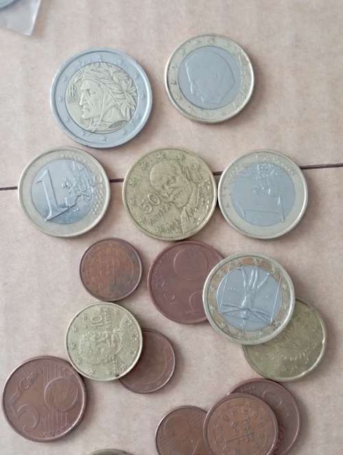 World Coins 200+ including Canadian silver dollar as per scan Shipping in description