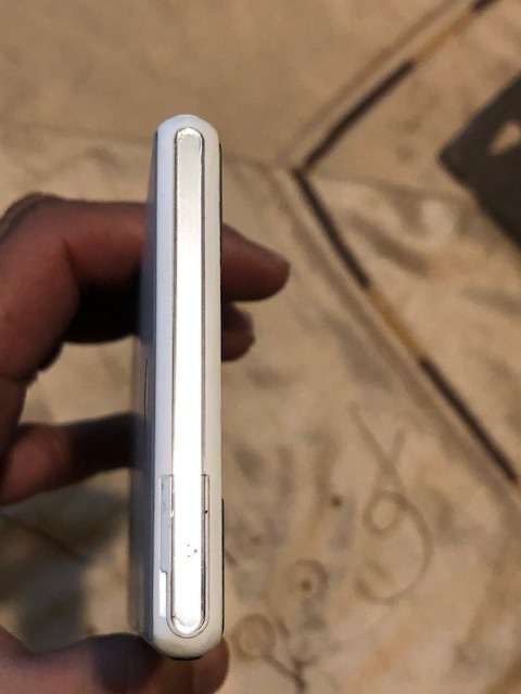 SONY EXPERIA M2 AQAU,WHITE,LIKE NEW CONDITION,CHARGER&USB CABLE,POUCH,TEMPERED GLASS PROTECTOR,LOCAL