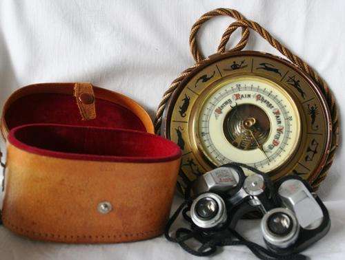 Weather barometer and binoculars