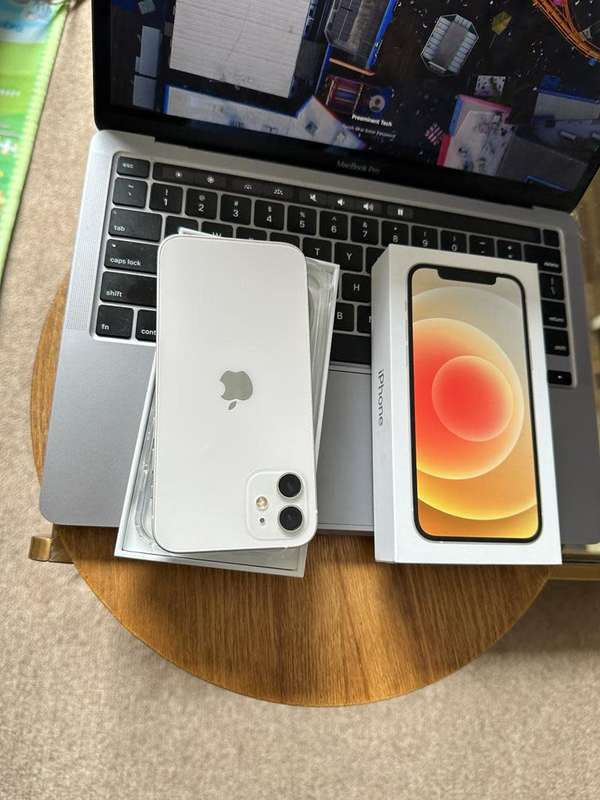 iPhone 12 , Silver (64GB)  Prestine Condition + box, charger and EXTRAS worth R499
